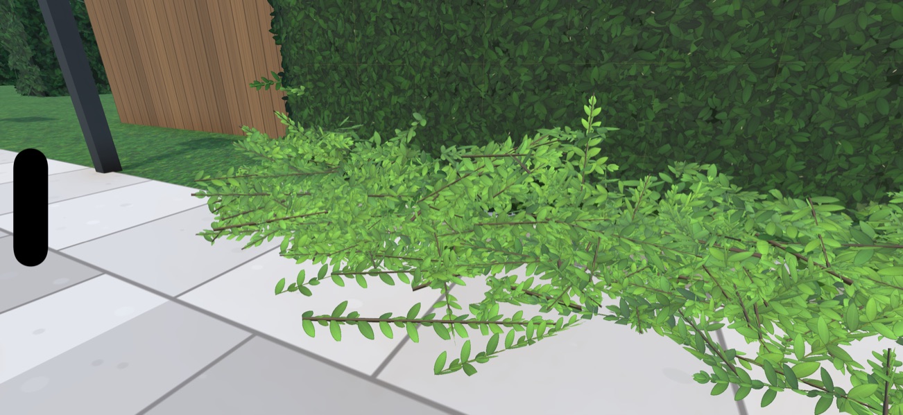 Screenshot: Clippings pile up at the foot of the hedge